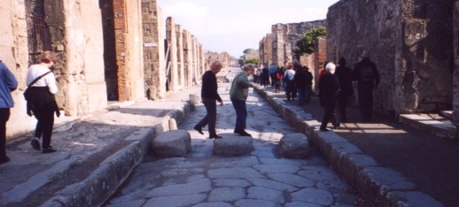 Carol stepping across Pompei street